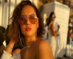 المغرب اليوم - ياسمين رئيس لا تزال تٌوثق لحظات قضائها شهر العسل على البحر1712447/103