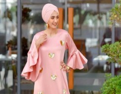 المغرب اليوم - إطلالات محجبات محتشمة مختارة من عروض أزياء موسم 2023