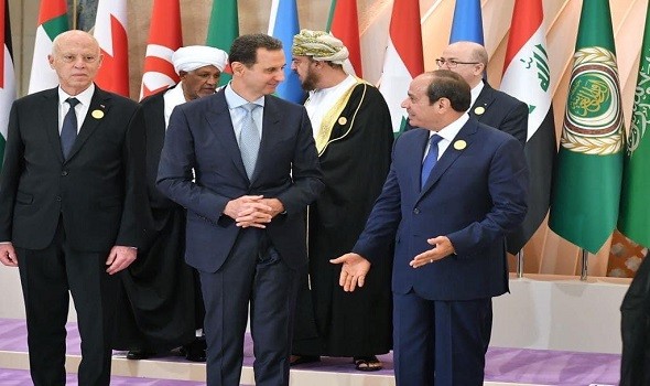 المغرب اليوم - سر المصافحة الحارة بين السيسي والأسد في أول لقاء بينهما
