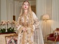 المغرب اليوم - موضة القفاطين الأنيقة تُسيطر على عروض الأزياء العالمية